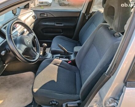 Сірий Міцубісі Lancer, об'ємом двигуна 1.6 л та пробігом 222 тис. км за 3990 $, фото 16 на Automoto.ua