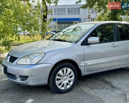 Сірий Міцубісі Lancer, об'ємом двигуна 1.58 л та пробігом 138 тис. км за 4990 $, фото 4 на Automoto.ua