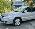 Сірий Міцубісі Lancer, об'ємом двигуна 1.58 л та пробігом 138 тис. км за 4990 $, фото 4 на Automoto.ua