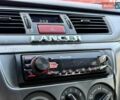 Сірий Міцубісі Lancer, об'ємом двигуна 1.6 л та пробігом 395 тис. км за 4900 $, фото 16 на Automoto.ua