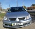 Сірий Міцубісі Lancer, об'ємом двигуна 1.6 л та пробігом 142 тис. км за 4700 $, фото 1 на Automoto.ua