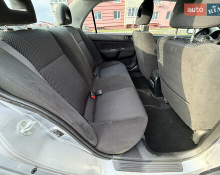 Серый Мицубиси Лансер, объемом двигателя 1.3 л и пробегом 160 тыс. км за 5555 $, фото 59 на Automoto.ua