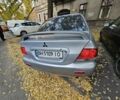 Серый Мицубиси Лансер, объемом двигателя 1.6 л и пробегом 199 тыс. км за 1450 $, фото 2 на Automoto.ua