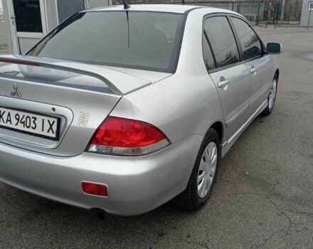 Сірий Міцубісі Lancer, об'ємом двигуна 1.6 л та пробігом 225 тис. км за 5500 $, фото 1 на Automoto.ua