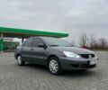 Сірий Міцубісі Lancer, об'ємом двигуна 1.6 л та пробігом 236 тис. км за 2100 $, фото 1 на Automoto.ua