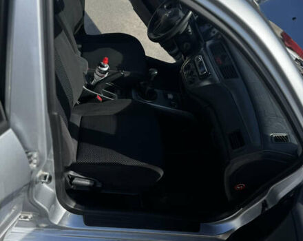 Серый Мицубиси Лансер, объемом двигателя 1.58 л и пробегом 261 тыс. км за 4500 $, фото 1 на Automoto.ua