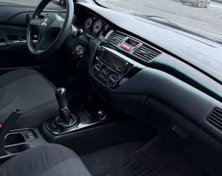 Серый Мицубиси Лансер, объемом двигателя 1.6 л и пробегом 350 тыс. км за 2850 $, фото 2 на Automoto.ua