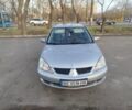 Сірий Міцубісі Lancer, об'ємом двигуна 1.6 л та пробігом 300 тис. км за 4200 $, фото 1 на Automoto.ua