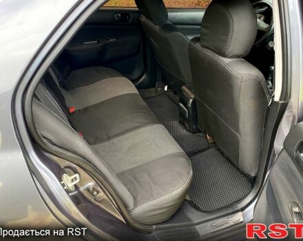 Серый Мицубиси Лансер, объемом двигателя 1.6 л и пробегом 212 тыс. км за 4600 $, фото 8 на Automoto.ua