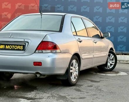Сірий Міцубісі Lancer, об'ємом двигуна 1.6 л та пробігом 395 тис. км за 4900 $, фото 9 на Automoto.ua