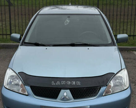 Серый Мицубиси Лансер, объемом двигателя 1.6 л и пробегом 238 тыс. км за 4400 $, фото 6 на Automoto.ua