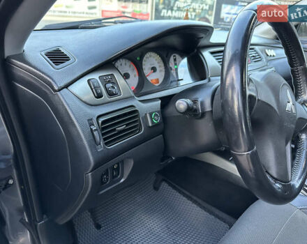 Сірий Міцубісі Lancer, об'ємом двигуна 1.6 л та пробігом 189 тис. км за 6200 $, фото 18 на Automoto.ua