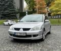 Серый Мицубиси Лансер, объемом двигателя 1.6 л и пробегом 195 тыс. км за 3900 $, фото 1 на Automoto.ua
