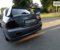 Сірий Міцубісі Lancer, об'ємом двигуна 1.6 л та пробігом 230 тис. км за 3950 $, фото 13 на Automoto.ua