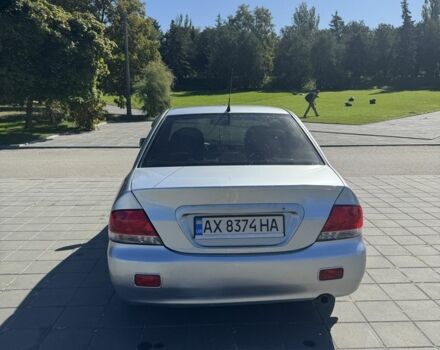 Серый Мицубиси Лансер, объемом двигателя 1.6 л и пробегом 265 тыс. км за 4100 $, фото 4 на Automoto.ua