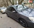 Сірий Міцубісі Lancer, об'ємом двигуна 1.58 л та пробігом 250 тис. км за 4750 $, фото 2 на Automoto.ua