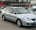 Серый Мицубиси Лансер, объемом двигателя 1.6 л и пробегом 195 тыс. км за 5300 $, фото 1 на Automoto.ua