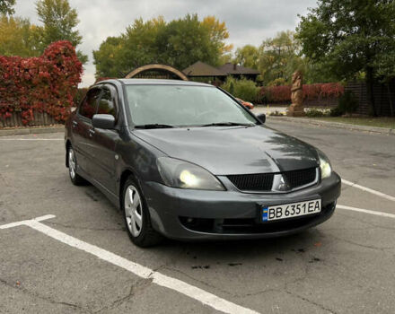 Сірий Міцубісі Lancer, об'ємом двигуна 1.58 л та пробігом 176 тис. км за 4700 $, фото 1 на Automoto.ua