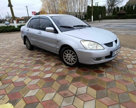 Серый Мицубиси Лансер, объемом двигателя 1.6 л и пробегом 238 тыс. км за 2900 $, фото 1 на Automoto.ua