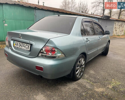 Серый Мицубиси Лансер, объемом двигателя 1.58 л и пробегом 205 тыс. км за 4750 $, фото 6 на Automoto.ua