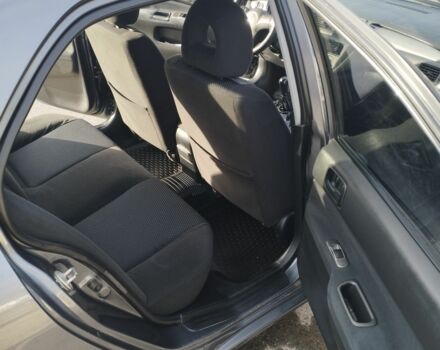 Сірий Міцубісі Lancer, об'ємом двигуна 1.6 л та пробігом 178 тис. км за 5464 $, фото 6 на Automoto.ua