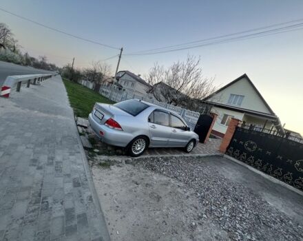 Сірий Міцубісі Lancer, об'ємом двигуна 0.16 л та пробігом 217 тис. км за 4200 $, фото 3 на Automoto.ua