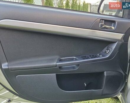 Серый Мицубиси Лансер, объемом двигателя 2 л и пробегом 282 тыс. км за 5450 $, фото 54 на Automoto.ua