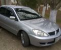 Сірий Міцубісі Lancer, об'ємом двигуна 1.6 л та пробігом 190 тис. км за 7500 $, фото 1 на Automoto.ua