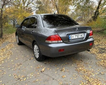 Сірий Міцубісі Lancer, об'ємом двигуна 1.6 л та пробігом 247 тис. км за 4900 $, фото 3 на Automoto.ua