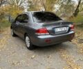 Сірий Міцубісі Lancer, об'ємом двигуна 1.6 л та пробігом 247 тис. км за 4900 $, фото 3 на Automoto.ua