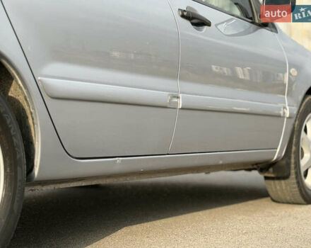 Серый Мицубиси Лансер, объемом двигателя 1.3 л и пробегом 160 тыс. км за 5555 $, фото 17 на Automoto.ua