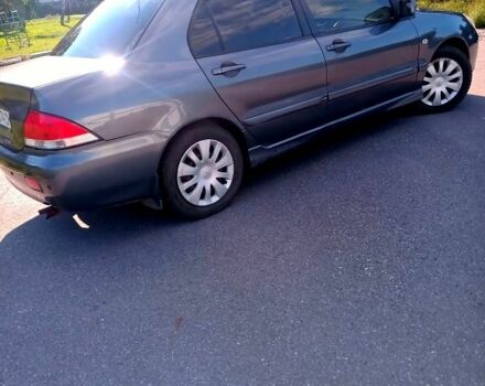 Сірий Міцубісі Lancer, об'ємом двигуна 1.6 л та пробігом 300 тис. км за 4400 $, фото 2 на Automoto.ua