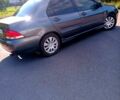Сірий Міцубісі Lancer, об'ємом двигуна 1.6 л та пробігом 300 тис. км за 4400 $, фото 2 на Automoto.ua