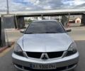 Сірий Міцубісі Lancer, об'ємом двигуна 2 л та пробігом 200 тис. км за 4982 $, фото 1 на Automoto.ua