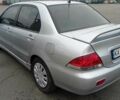 Сірий Міцубісі Lancer, об'ємом двигуна 1.6 л та пробігом 225 тис. км за 5500 $, фото 2 на Automoto.ua