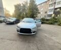 Серый Мицубиси Лансер, объемом двигателя 2 л и пробегом 250 тыс. км за 5320 $, фото 1 на Automoto.ua
