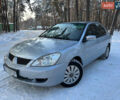 Сірий Міцубісі Lancer, об'ємом двигуна 1.58 л та пробігом 240 тис. км за 3750 $, фото 1 на Automoto.ua