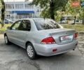 Сірий Міцубісі Lancer, об'ємом двигуна 1.58 л та пробігом 138 тис. км за 4990 $, фото 8 на Automoto.ua