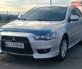 Серый Мицубиси Лансер, объемом двигателя 1.5 л и пробегом 166 тыс. км за 6999 $, фото 1 на Automoto.ua