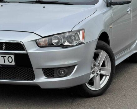 Серый Мицубиси Лансер, объемом двигателя 2 л и пробегом 207 тыс. км за 5800 $, фото 4 на Automoto.ua