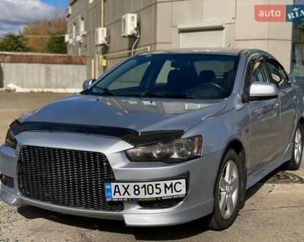 Серый Мицубиси Лансер, объемом двигателя 2 л и пробегом 150 тыс. км за 6100 $, фото 4 на Automoto.ua
