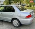 Сірий Міцубісі Lancer, об'ємом двигуна 1.58 л та пробігом 138 тис. км за 4990 $, фото 9 на Automoto.ua