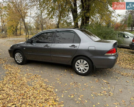 Сірий Міцубісі Lancer, об'ємом двигуна 1.58 л та пробігом 247 тис. км за 4900 $, фото 8 на Automoto.ua
