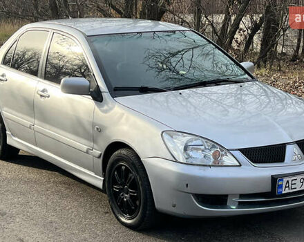 Серый Мицубиси Лансер, объемом двигателя 1.58 л и пробегом 290 тыс. км за 3750 $, фото 10 на Automoto.ua