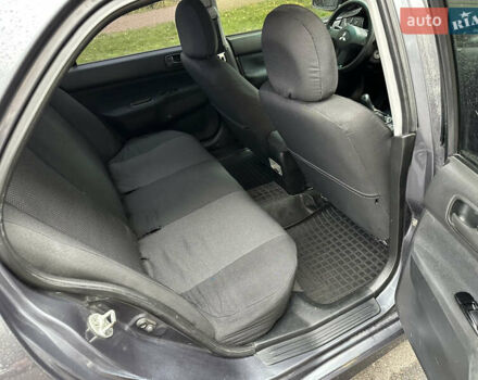 Серый Мицубиси Лансер, объемом двигателя 1.6 л и пробегом 115 тыс. км за 2800 $, фото 9 на Automoto.ua