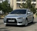 Серый Мицубиси Лансер, объемом двигателя 2 л и пробегом 180 тыс. км за 6000 $, фото 1 на Automoto.ua