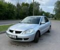 Сірий Міцубісі Lancer, об'ємом двигуна 1.58 л та пробігом 233 тис. км за 4200 $, фото 1 на Automoto.ua
