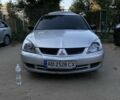 Сірий Міцубісі Lancer, об'ємом двигуна 1.6 л та пробігом 317 тис. км за 2400 $, фото 1 на Automoto.ua