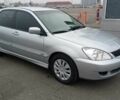 Сірий Міцубісі Lancer, об'ємом двигуна 1.6 л та пробігом 225 тис. км за 5500 $, фото 1 на Automoto.ua