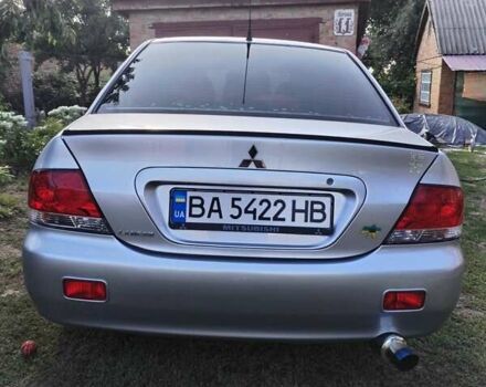 Сірий Міцубісі Lancer, об'ємом двигуна 1.6 л та пробігом 290 тис. км за 4600 $, фото 15 на Automoto.ua